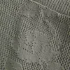 Łatwa w noszeniu koszulka babydoll z odkrytymi ramionami w stylu haftu igłowego Łatwa w noszeniu koszulka babydoll z odkrytymi ramionami w stylu haftu igłowego