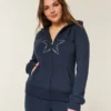 Bluza z kapturem i zamkiem błyskawicznym z nadrukiem gwiazdy Bluza z kapturem i zamkiem błyskawicznym z nadrukiem gwiazdy