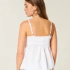 Błyszcząca haftowana bluzka babydoll