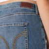 Dżinsy bootcut o średnim stanie i średnim odcieniu Dżinsy bootcut o średnim stanie i średnim odcieniu