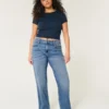 Dżinsy typu dad jeans z wysokim stanem i ciemnym wykończeniem Dżinsy typu dad jeans z wysokim stanem i ciemnym wykończeniem