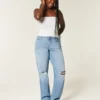 Dżinsy typu dad jeans z wysokim stanem, z przetarciami i średnim wypraniem Dżinsy typu dad jeans z wysokim stanem, z przetarciami i średnim wypraniem