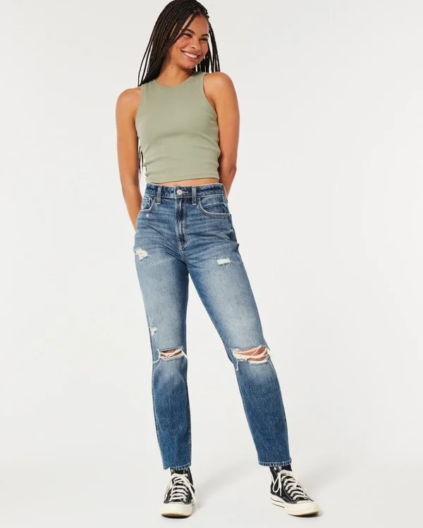 Dżinsy typu mom jeans z bardzo wysokim stanem, przetarciami i średnim wybarwieniem Dżinsy typu mom jeans z bardzo wysokim stanem, przetarciami i średnim wybarwieniem