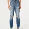 Dżinsy typu mom jeans z bardzo wysokim stanem, przetarciami i średnim wybarwieniem Dżinsy typu mom jeans z bardzo wysokim stanem, przetarciami i średnim wybarwieniem