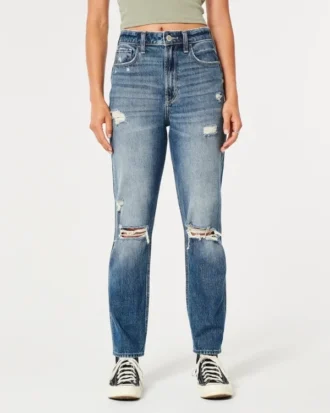 Dżinsy typu mom jeans z bardzo wysokim stanem, przetarciami i średnim wybarwieniem
