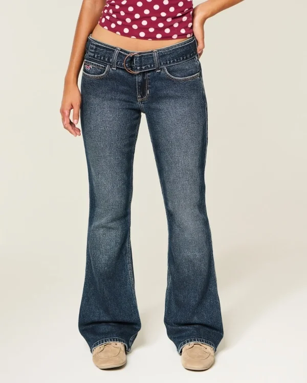 Dżinsy z niskim stanem, ciemnym wykończeniem i paskiem Dżinsy z niskim stanem, ciemnym wykończeniem i paskiem