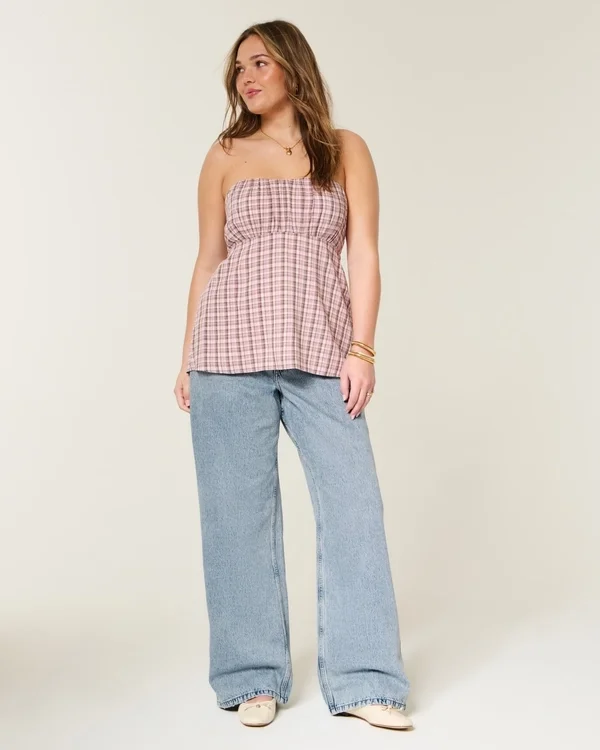 Dżinsy z niskim stanem, średnim odcieniem i luźnym krojem Dżinsy z niskim stanem, średnim odcieniem i luźnym krojem