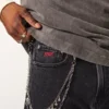 Hollister x Taco Bell Wyprane czarne jeansy z haftowanym nadrukiem Hollister x Taco Bell Wyprane czarne jeansy z haftowanym nadrukiem