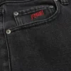 Hollister x Taco Bell Wyprane czarne jeansy z haftowanym nadrukiem Hollister x Taco Bell Wyprane czarne jeansy z haftowanym nadrukiem