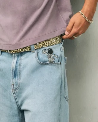 Jasne dżinsy z nadrukiem astronauty Super Baggy Jeans