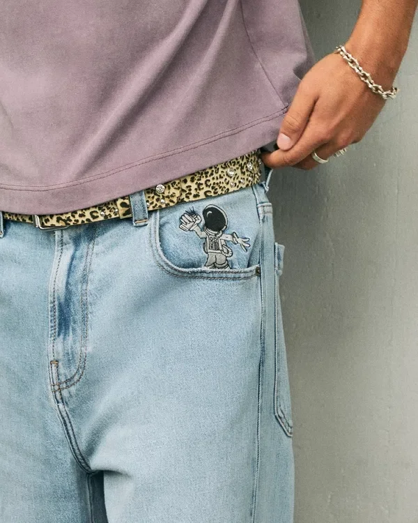 Jasne dżinsy z nadrukiem astronauty Super Baggy Jeans Jasne dżinsy z nadrukiem astronauty Super Baggy Jeans