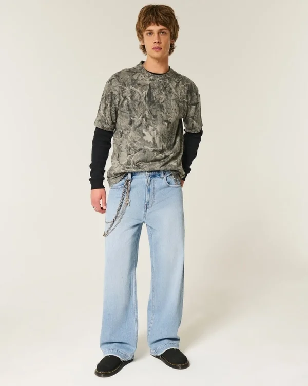 Jasne dżinsy z nadrukiem astronauty Super Baggy Jeans Jasne dżinsy z nadrukiem astronauty Super Baggy Jeans