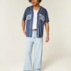 Jasne dżinsy z nadrukiem New York Graphic Super Baggy Jasne dżinsy z nadrukiem New York Graphic Super Baggy