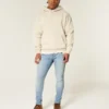 Jasne jeansy skinny o sportowym kroju Jasne jeansy skinny o sportowym kroju