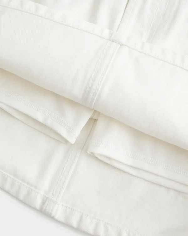 Mini spódniczka z białego denimu z niskim stanem Mini spódniczka z białego denimu z niskim stanem
