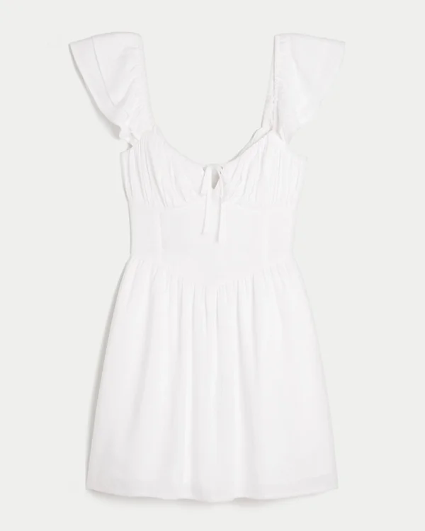 Mini sukienka z falbanami i dekoltem w szpic Mini sukienka z falbanami i dekoltem w szpic