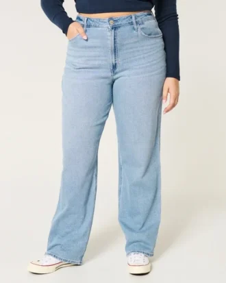 Obcisłe jeansy typu dad jeans z bardzo wysokim stanem i średnim odcieniem Obcisłe jeansy typu dad jeans z bardzo wysokim stanem i średnim odcieniem