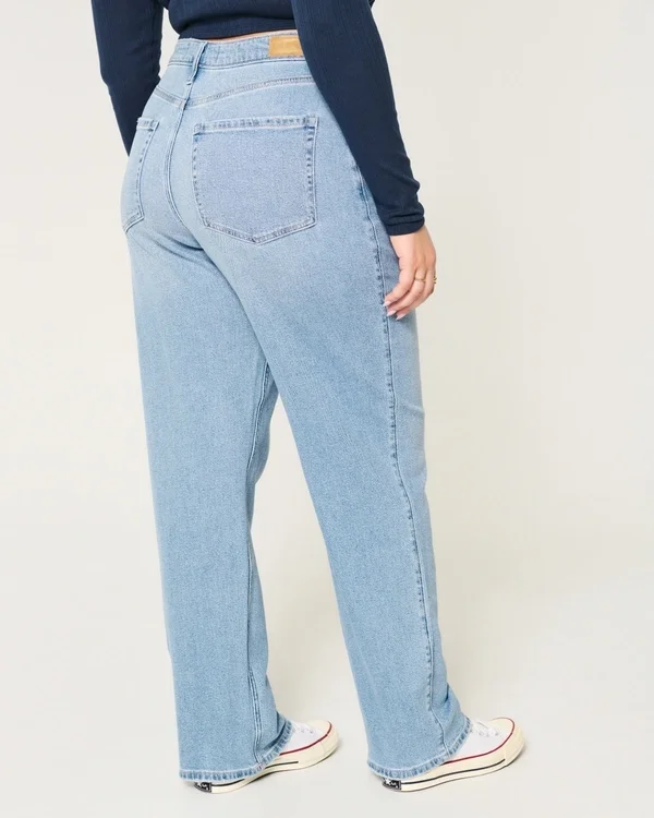 Obcisłe jeansy typu dad jeans z bardzo wysokim stanem i średnim odcieniem Obcisłe jeansy typu dad jeans z bardzo wysokim stanem i średnim odcieniem
