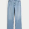 Obcisłe jeansy typu dad jeans z bardzo wysokim stanem i średnim odcieniem Obcisłe jeansy typu dad jeans z bardzo wysokim stanem i średnim odcieniem