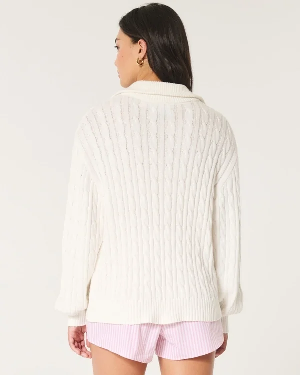 Oversize’owy sweter z półsuwakiem i splotem warkoczowym Oversize’owy sweter z półsuwakiem i splotem warkoczowym