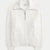 Oversize’owy sweter z półsuwakiem i splotem warkoczowym Oversize’owy sweter z półsuwakiem i splotem warkoczowym