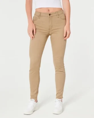 Spodnie z wysokim stanem w kolorze khaki, o bardzo wąskim kroju