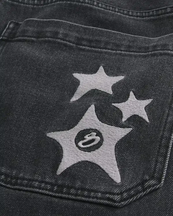 Sprane czarne dżinsy z nadrukiem gwiazdy Super Baggy Sprane czarne dżinsy z nadrukiem gwiazdy Super Baggy