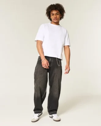 Sprane czarne jeansy skater baggy z haftowanym wężem