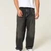 Sprane czarne jeansy skater baggy z haftowanym wężem Sprane czarne jeansy skater baggy z haftowanym wężem