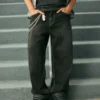 Sprane czarne jeansy skater baggy z haftowanym wężem Sprane czarne jeansy skater baggy z haftowanym wężem