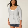 Sweter typu babydoll z dzianiny warkoczowej