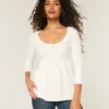 Sweter typu babydoll z dzianiny warkoczowej Sweter typu babydoll z dzianiny warkoczowej