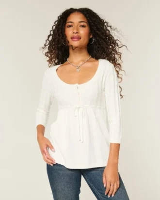 Sweter typu babydoll z dzianiny warkoczowej Sweter typu babydoll z dzianiny warkoczowej
