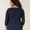 Sweter typu babydoll z dzianiny warkoczowej