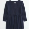 Sweter typu babydoll z dzianiny warkoczowej