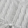 Sweter typu babydoll z dzianiny warkoczowej
