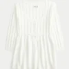 Sweter typu babydoll z dzianiny warkoczowej Sweter typu babydoll z dzianiny warkoczowej