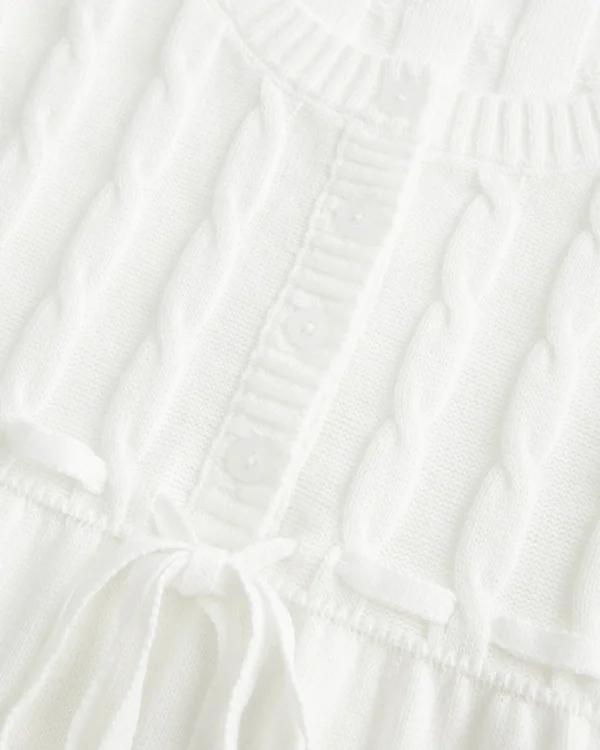 Sweter typu babydoll z dzianiny warkoczowej Sweter typu babydoll z dzianiny warkoczowej