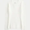 Sweter z dzianiny warkoczowej Sweter z dzianiny warkoczowej