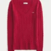 Sweter z dzianiny warkoczowej z dekoltem w serek Sweter z dzianiny warkoczowej z dekoltem w serek