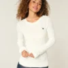 Sweter z dzianiny warkoczowej z gwiazdami Sweter z dzianiny warkoczowej z gwiazdami