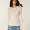 Sweter z dzianiny warkoczowej z sercem