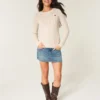 Sweter z dzianiny warkoczowej z sercem