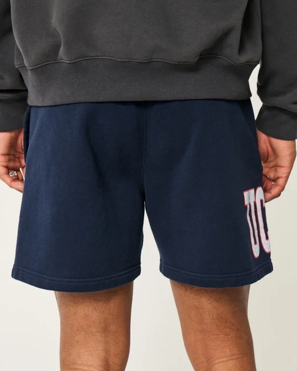 Szorty z polaru do połowy uda z grafiką UConn Huskies Szorty z polaru do połowy uda z grafiką UConn Huskies