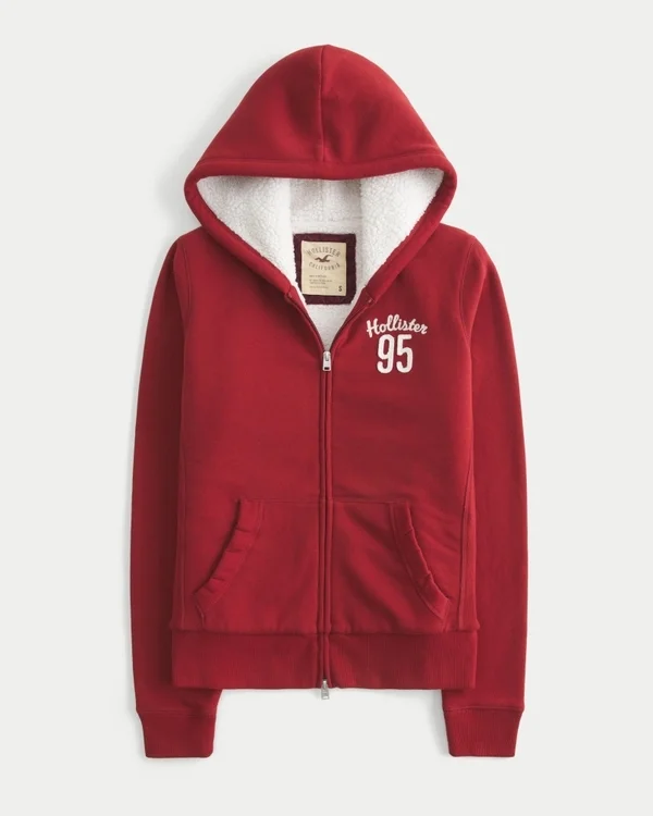 Świąteczna kolekcja Sherpa-Lined Zip-Up Logo Graphic Hoodie Świąteczna kolekcja Sherpa-Lined Zip-Up Logo Graphic Hoodie